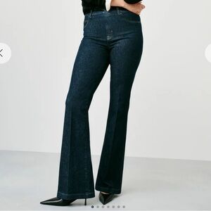 Women’s Spanx Spanxshape Everywhere Flare jeans in Raw Indigo.  Size 2X Reg